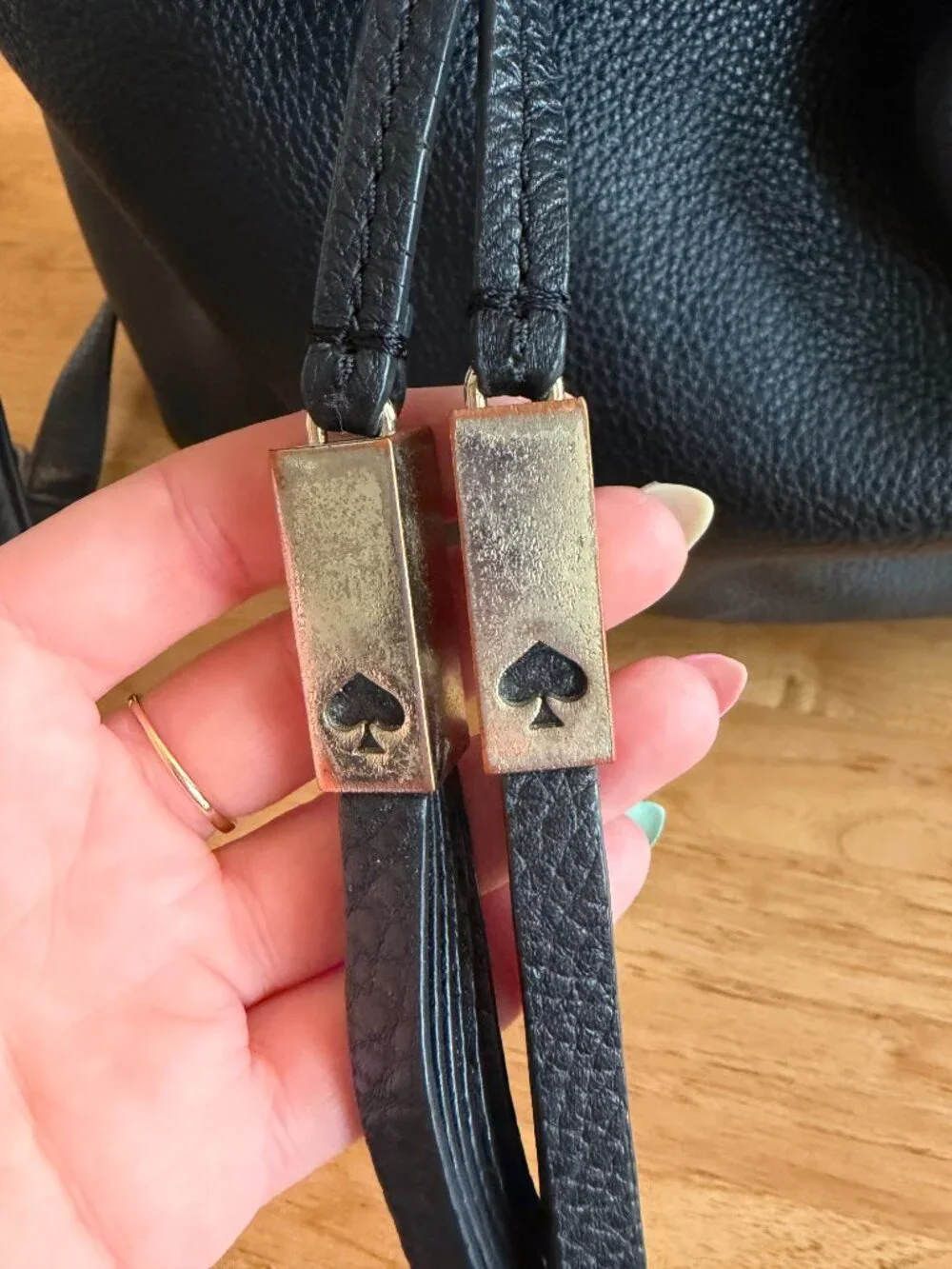 Kate Spade Pebbled Leather Backpack with tassles
